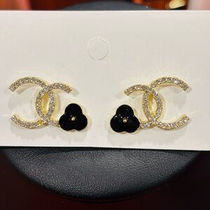 Gold and Black Crystal Earrings with push back closure. New on the card